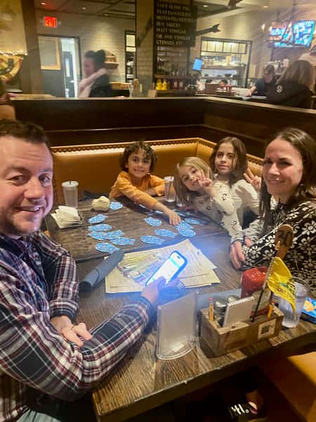family of 5 playing Go Fish