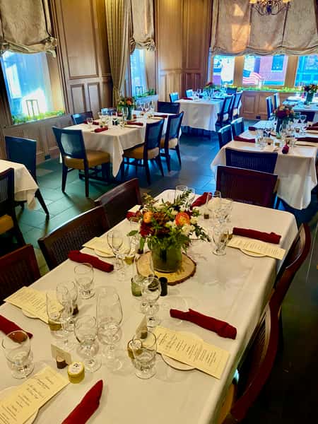 Upham Room facing windows, maroon napkins
