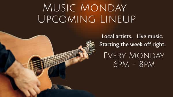 acoustic guitar with promotion for Music Monday at Rising Eagle