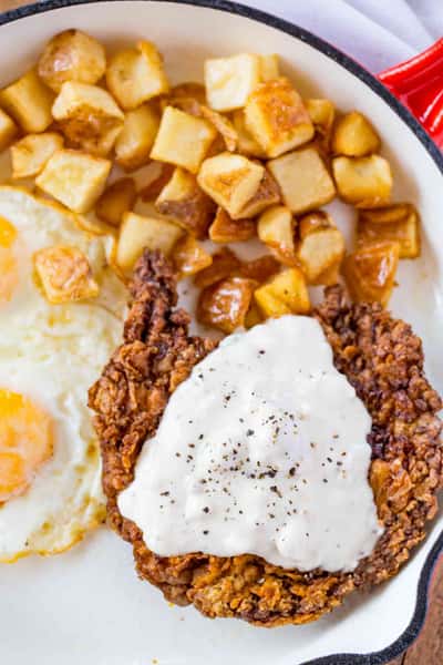 Chicken fried steak and home fries