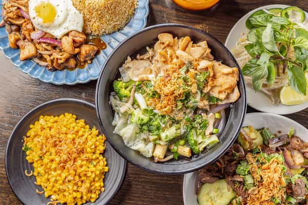 A spread of various foods and drinks on a table