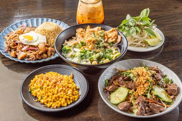 A variety of dishes and drinks on a table