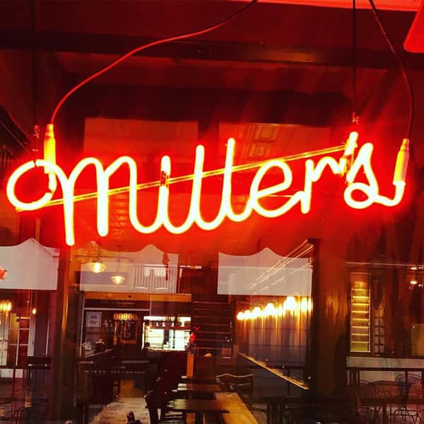Miller's red neon sign in window