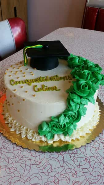 green graduation cake