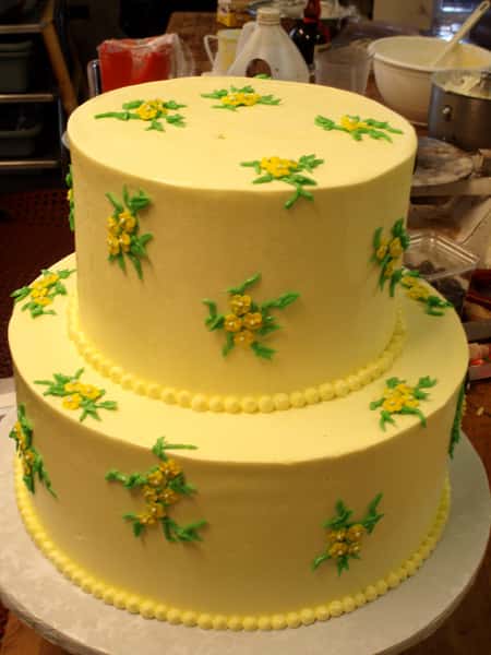 yellow cake with roses