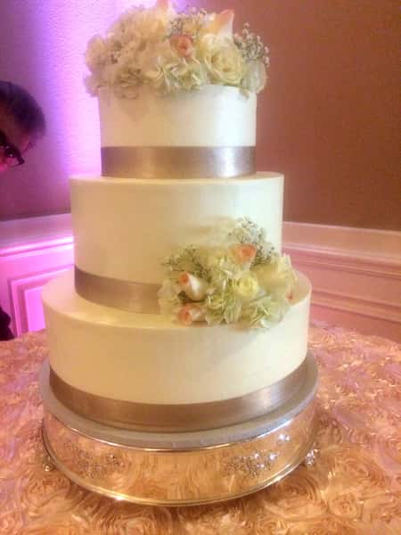 cake with gold ribbon