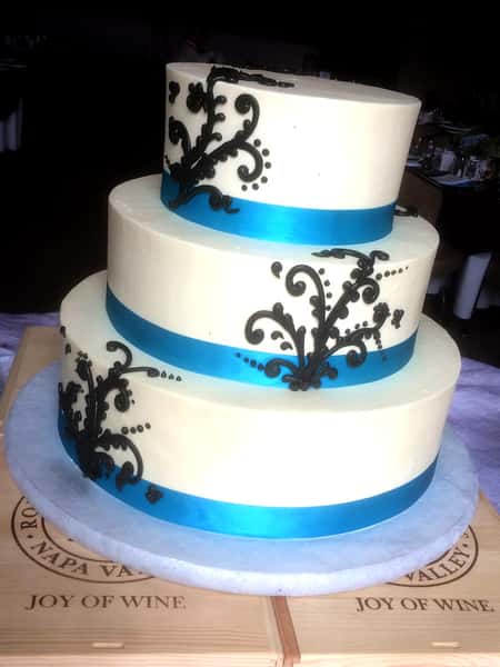 cake with blue ribbon