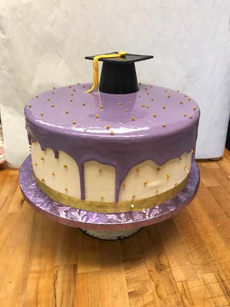 graduation cake with purple icing