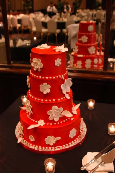 red cake and flowers