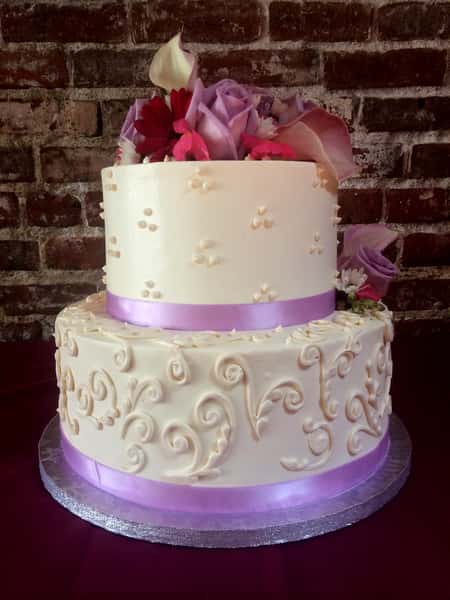 cake with purple ribbon
