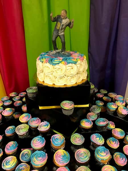 rainbow cake and cupcakes