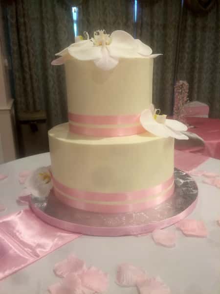 cake with pink ribbon