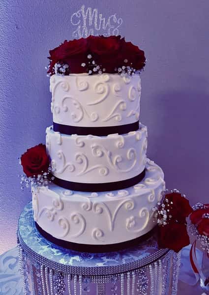 cake with purple ribbon