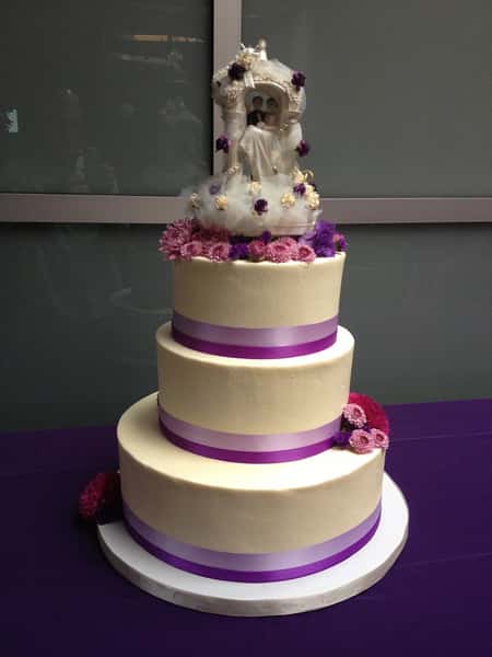 cake with purple ribbon