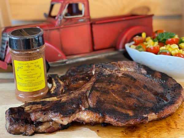 Meat and seasoning with a bowl on the side
