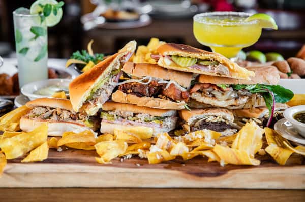 Ready for a flavor-packed journey to Cuba without leaving your home? 🏝️🥪 Enjoy our El Cubano (Queso suizo, jamón, pierna, mostaza, pepinillos), a classic Cuban sandwich layered with Swiss cheese, ham, pork, mustard and pickles. It's a little piece of Havana in every bite! Chips not included in order. Additional charge applies. #CafePiquet #CubanCuisine #ElCubano #FoodieFriday 🌴🎉