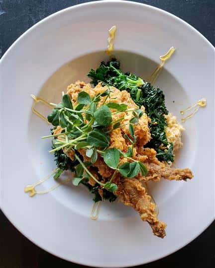 fried shrimp over sauteed spinach