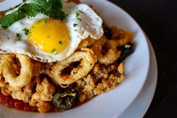 fried calamari with a fried egg on top