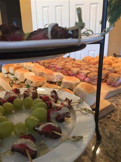 small sandwiches lined together for a buffet