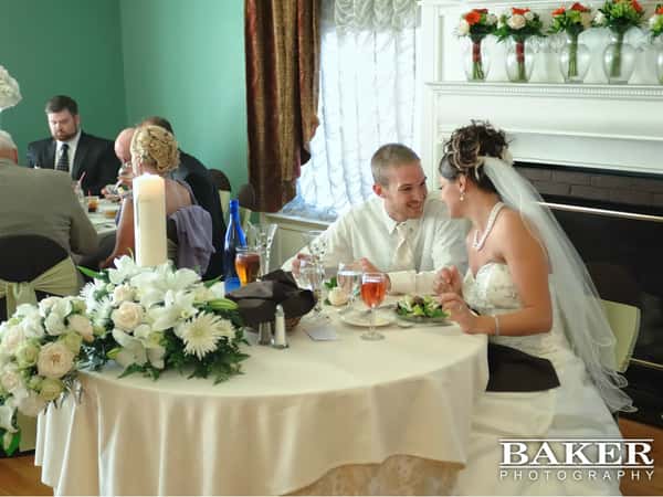 bride and groom dining