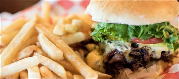 Amazing burger with fries