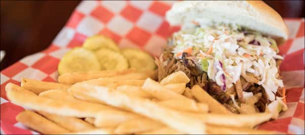 Shredded meat sandwich with fries