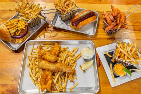 spread of fast food items including fries, burgers and tenders