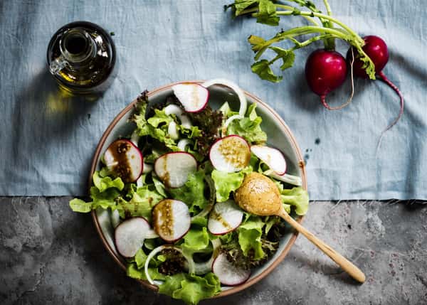 salad topped with cucumbers