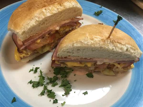 breakfast sandwhich with ham and eggs