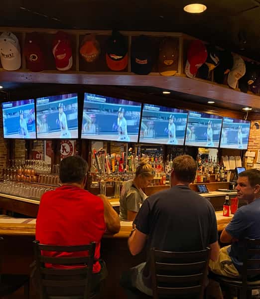 Bar stools and TV setup