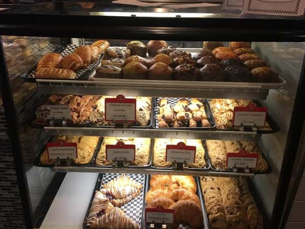Glass display showing several different pastries