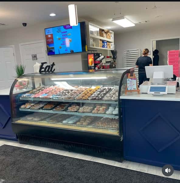 display case with donuts
