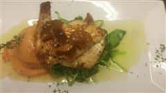 Chef Specialty dish with greens