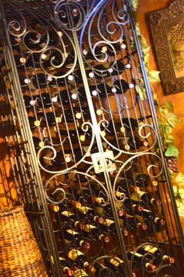 Wine behind a metal cage