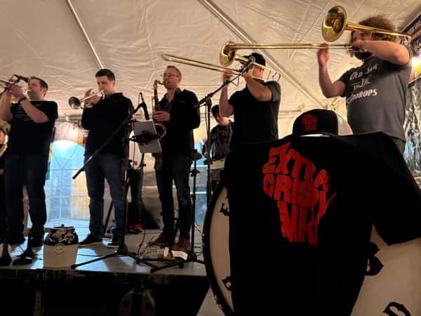 Extra Crispy Brass Band on stage