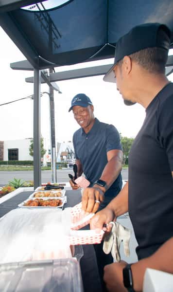 Byron Scott getting ready to enjoy some wings