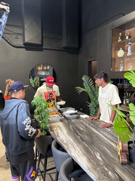 Michigan rapper Ankith Woods with Aaron at a catering for LRG Clothing HQ
