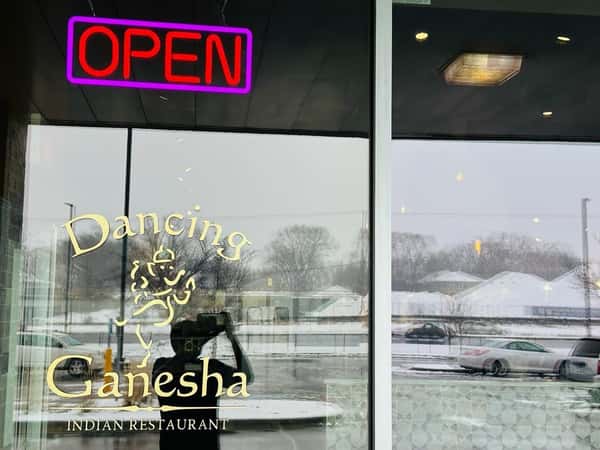 Outside the doors of the restaurant