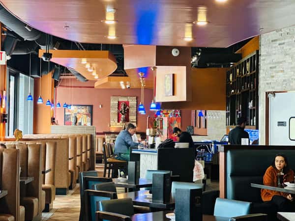 Interior of restaurant with customers