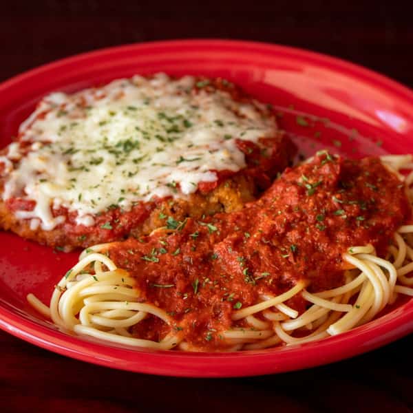 chicken Parm is served up with a side of spaghetti and marinara