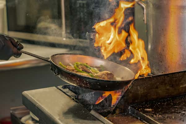 cooking over large flame