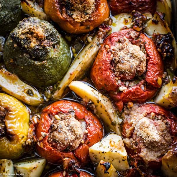 Greek stuffed vegetables with tomatoes, peppers, and zucchini baked in olive oil and herbs