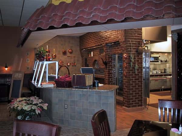 brick wall with an oven and chicken rotisserie built in