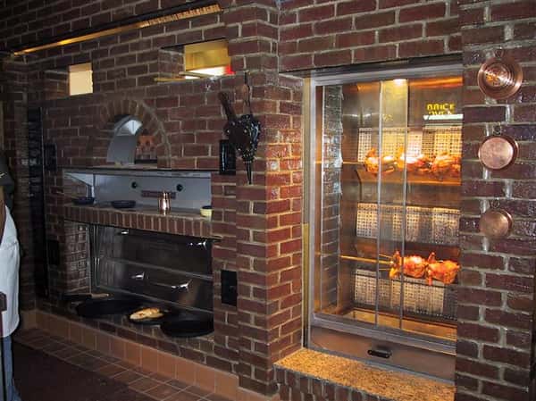 brick wall with an oven and chicken rotisserie built in