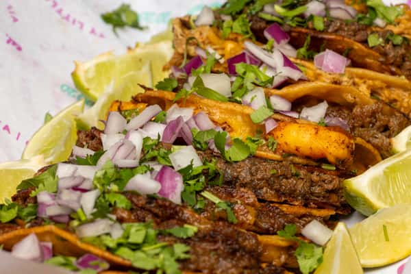 assorted plate of birria tacos