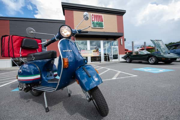 The Evviva Vespa Seen In Front of Evviva Maynard