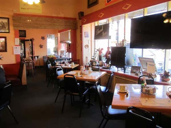 dining area with tables and chairs
