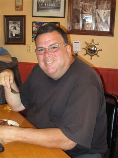 man smiling for picture
