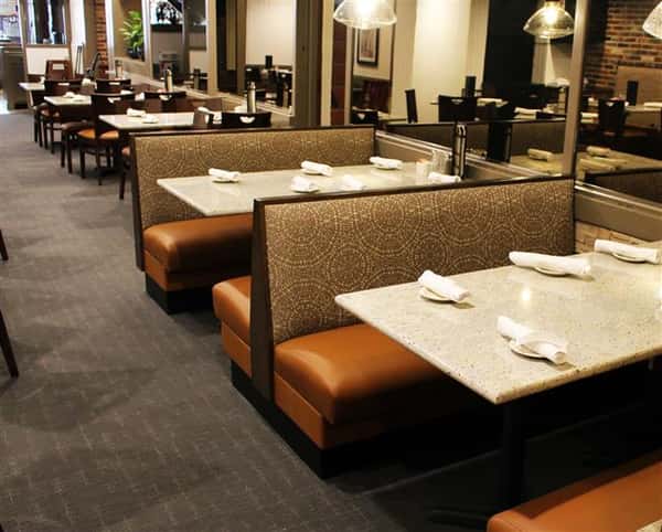 Dining area with rolled napkins