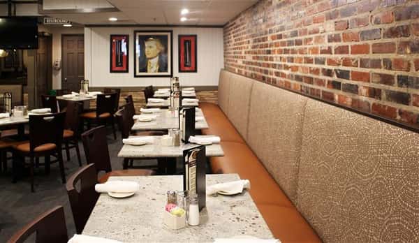 Dining area with painting in the background